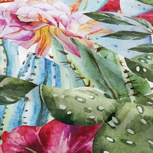 Macro texture showing watercolor floral cactus print on woven bohemian tapestry fabric