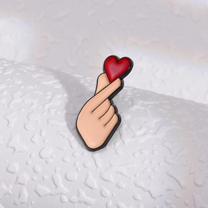 Cute cartoon finger heart enamel pin with red heart accessory for men and women