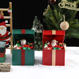 Leuchtende Weihnachtsspieluhr-Set mit Harzfiguren wie Weihnachtsmann und Schneemann in Rot