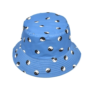 Sky blue bucket hat with black and white Yin Yang patterns, casual outdoor sun protection cap