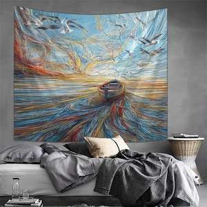 Detail of sunrise ocean tapestry with seagulls and boat on a grey industrial wall