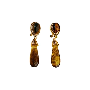 Vintage gold teardrop earrings with tiger eye stone and diamond accents on white background