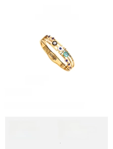 Detail showing 60mm inner diameter and 12mm width of the gold plated evil eye cuff