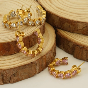 Elegant gold-plated C-shaped earrings with heart-cut white and pink zirconia stones