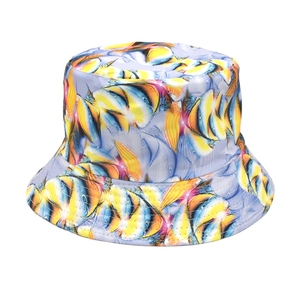 Detail of wide brim bucket hat featuring colorful 3D tropical fish tie-dye patterns
