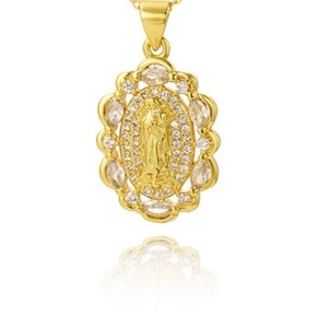 Detailed close-up of golden Virgin Mary pendant with sparkling cubic zirconia settings