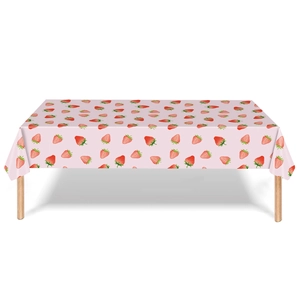 Pink strawberry party tablecloth for girls birthday decor on a white background