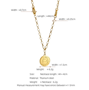 Close-up of gold titanium steel sun flower smiley necklace with detailed size dimensions