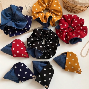 Double-layered polka dot scrunchie hair ties in assorted colors with denim texture