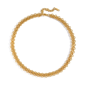 Detail of gold handmade chain necklace with intricate interlocking links and lobster clasp