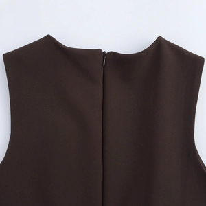 Detail of the back neckline featuring a hidden zipper on a coffee brown slim dress
