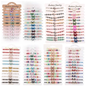 Detailed grid view of assorted butterfly charm woven bracelets with colorful crystal beads