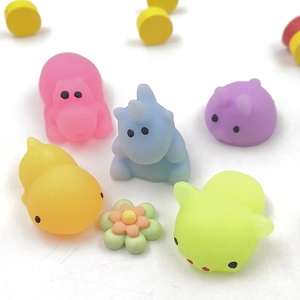 Close-up of colorful soft TPR squishy stress relief animals on white background