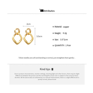 Detailed technical drawing and size measurements for gold geometric twist earrings