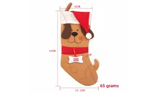 Detail of plush dog Christmas stocking with festive Santa hat and bone charm