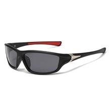 Detail view of punk steampunk sunglasses with black matte frame and red anti-slip temple pads