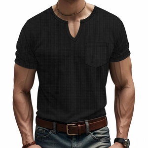 Close-up of black V-neck t-shirt featuring waffle texture fabric and chest pocket detail