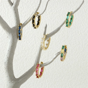 Detail of 18K gold plated hoop earrings with multi-colored rectangular zircon stones