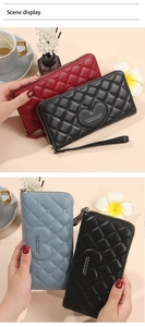 Detailed view of quilted long wallets with zip closure and heart pattern in three colors