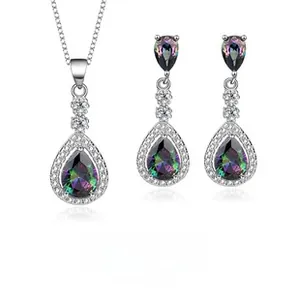 Detailed close-up of S925 sterling silver jewelry set with pear-cut mystic topaz stones