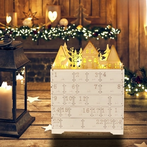 Detail of wooden advent calendar featuring LED lights and 24 numbered drawers for Christmas