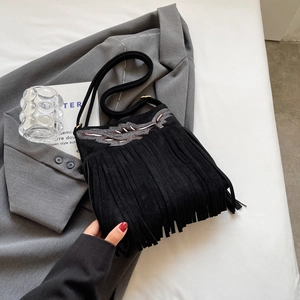 Retro black suede crossbody bag with fringe tassels and sequined wing embroidery