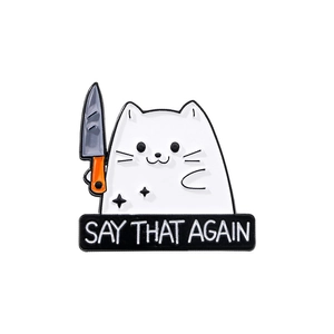 Funny white cat enamel pin holding a knife with Say That Again text on white background