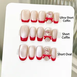 Unghie Finte Press On French Tip Rosse Base Perla Artificial Occhio Di Gatto Con Fiocchi 3D E Strass Forma Bara Corta Fatto A Mano