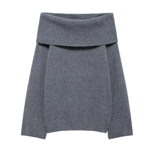 Close-up of the grey ribbed knit texture and off-the-shoulder collar detail on the sweater