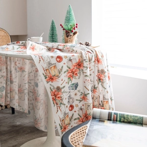 Christmas velvet tablecloth with poinsettia and gift box prints for festive dining table