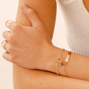 Gold letter M bracelet with red gemstone charm and floral engraved jewelry set