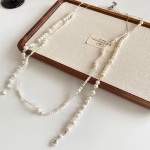 Détails de collier en perles vintage français avec pendentif goutte d'eau argenté élégant