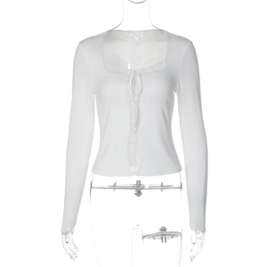 Detailed view of the lace square neckline and ribbon tie on this white slim-fit top