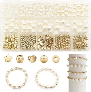 Macro view of 15-grid jewelry kit with pearls and gold star beads for DIY bracelets