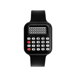 Detail view of the black silicone strap and functional numeric keypad on a digital watch