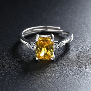 Elegant silver open ring with rectangle yellow zircon and side triangle stones