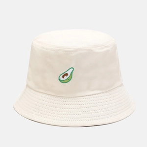 Close-up of cute avocado embroidery on cream cotton bucket hat with detailed stitching