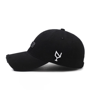 Vintage black distressed baseball cap with 66 embroidery and torn brim detail