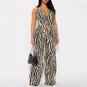 Detail of zebra print V-neck button vest and high-waisted wide-leg trousers two-piece set