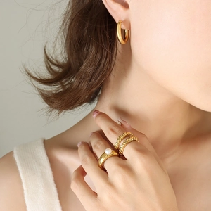 18K gold plated thick hoop earring and pearl textured ring set on female model
