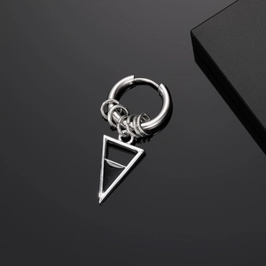 Detail view of silver punk hoop earring with black enamel triangle pendant on black backdrop