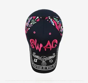 Detailed top view of navy baseball cap with pink SWAG embroidery and graffiti patterns