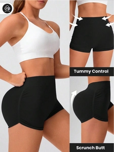 Detail of high waist tummy control and scrunch butt design on black gym shorts