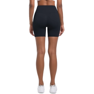 Detail of high waisted black yoga shorts with V-shaped back seam for butt lifting effect