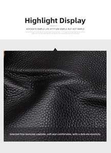 Macro shot of high-quality black genuine leather with detailed lychee grain texture