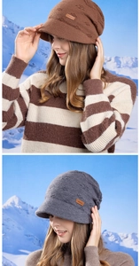 Detailed knit texture and JOYLORD leather patch on winter beanies with snow mountain view