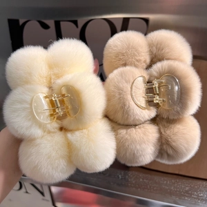 Furry flower hair claws in cream and light brown plush material for women