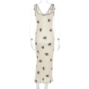 Rear view detail of V-neck ruffled backless floral midi dress with black edge trims