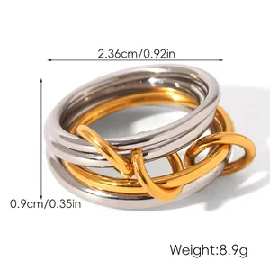 Detailed view of interconnected two-tone stainless steel rings with size and weight metrics