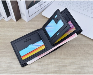 Men's black soft leather short wallet featuring multiple card slots and detailed interior design.